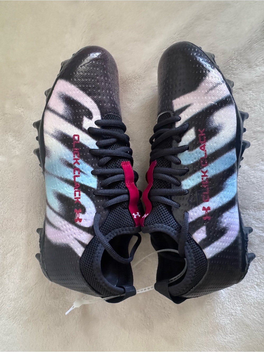Under Armour Kids Blur Select Click Clack football cleats 

Siz